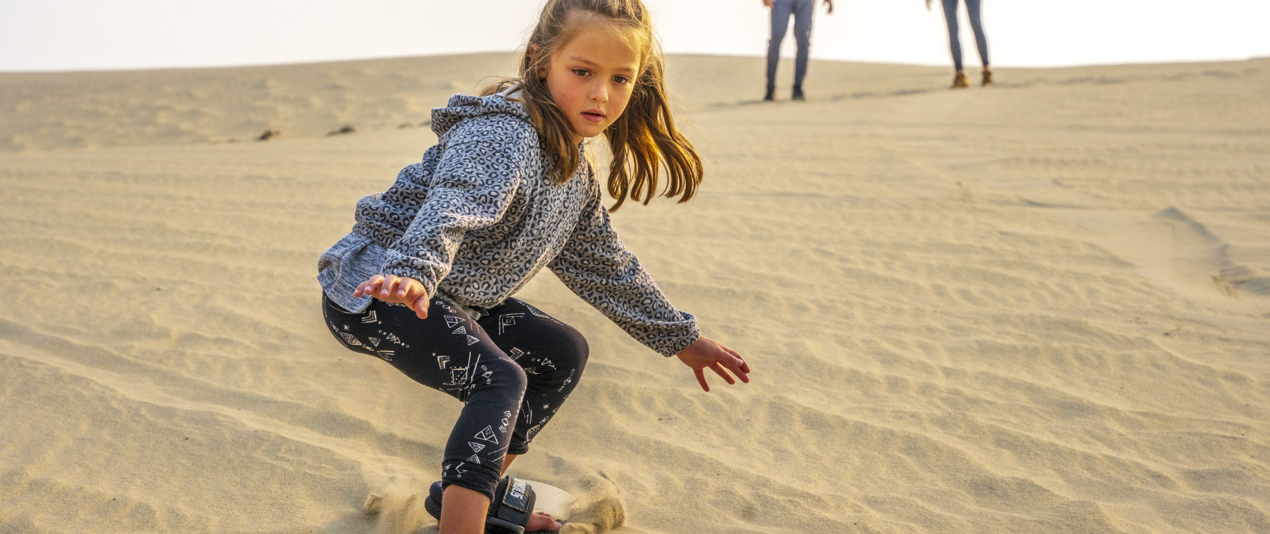 Beginner's Guide to Sandboarding at Killpecker Sand Dunes